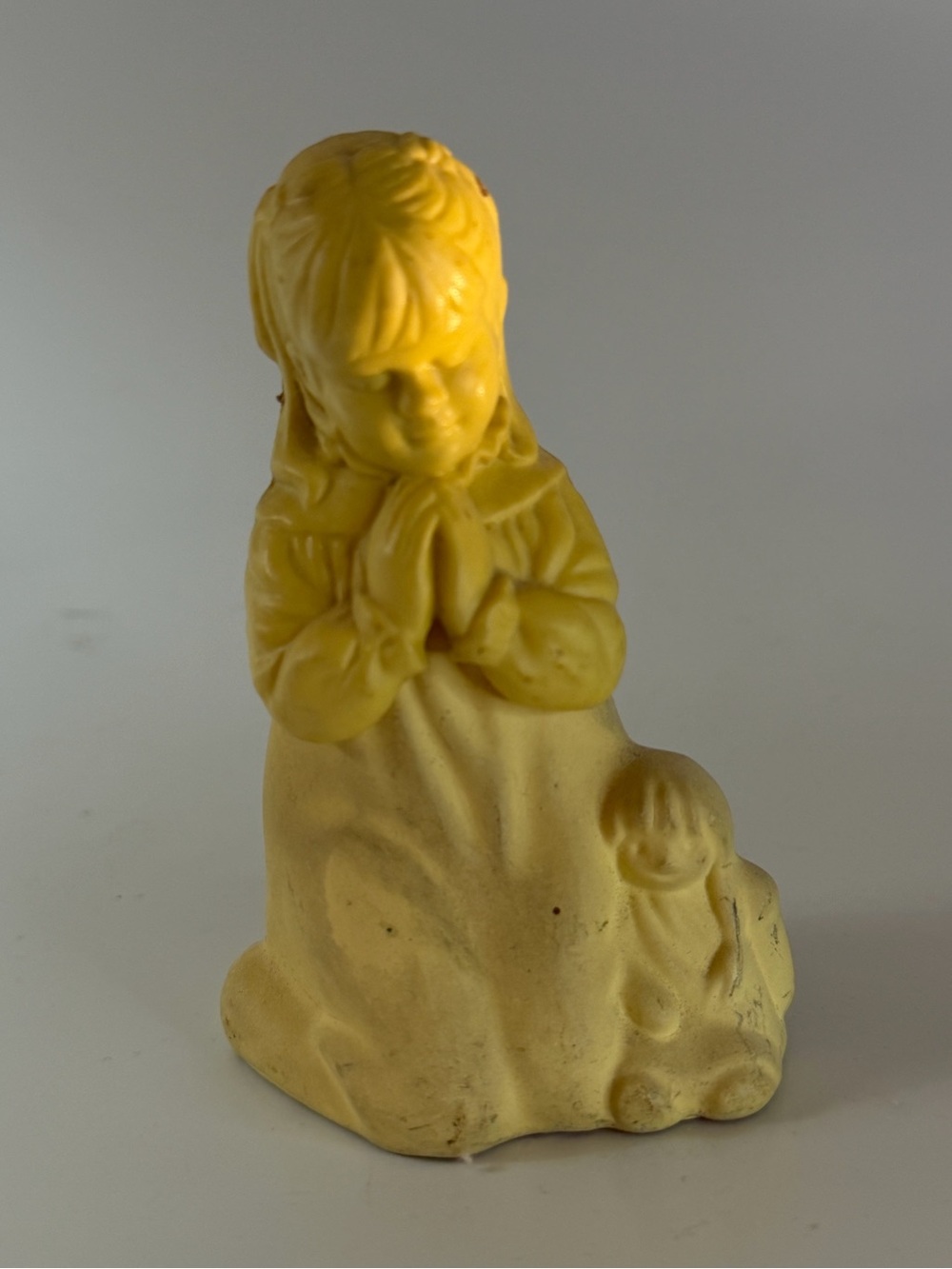 Avon vintage “First Prayer” glass perfume bottle figurine. Girl with doll.
